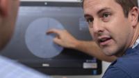 Interventional radiologist in consultation with patient